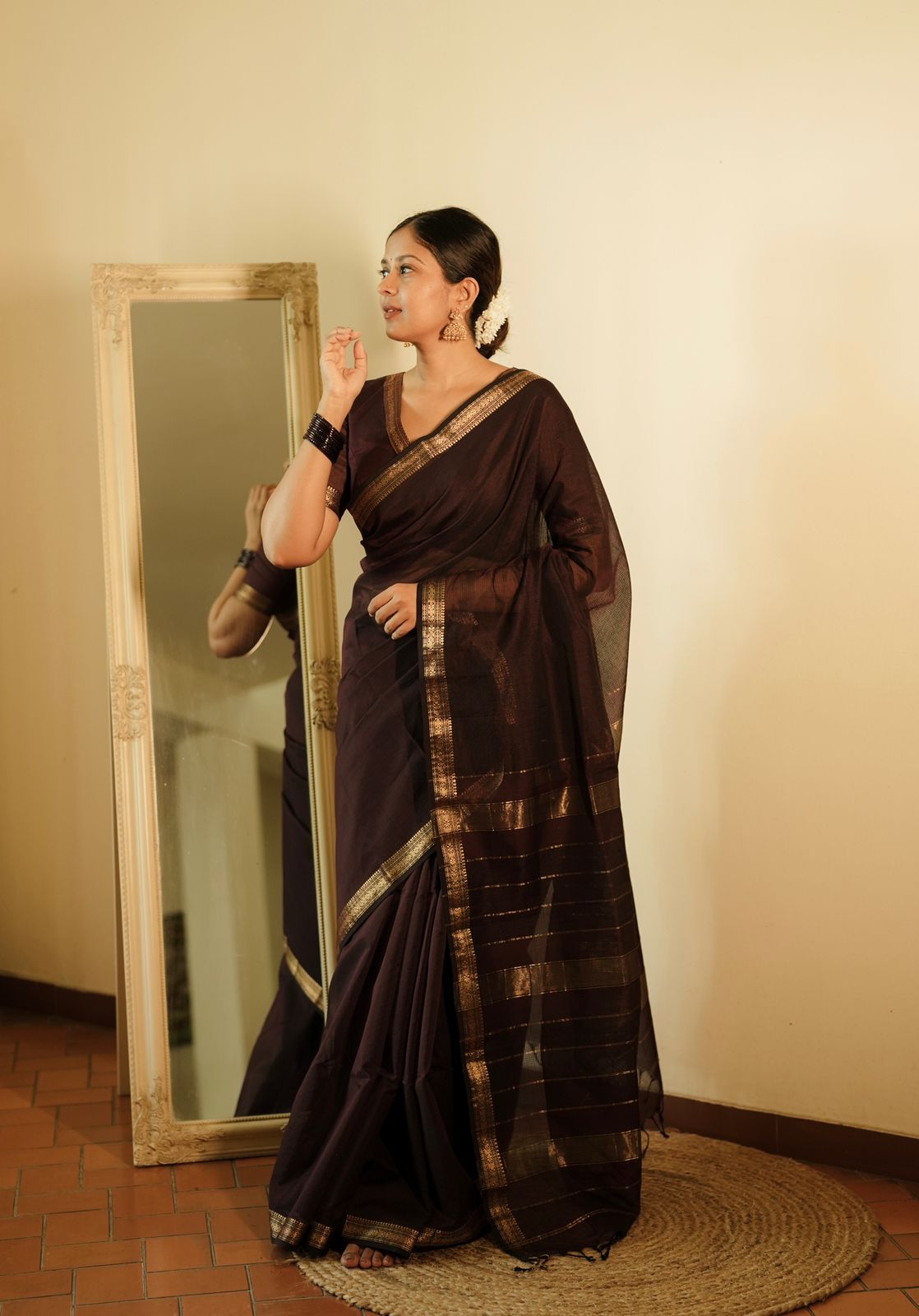 Mahogany Maheshwari saree with zari border and zari lines on pallu