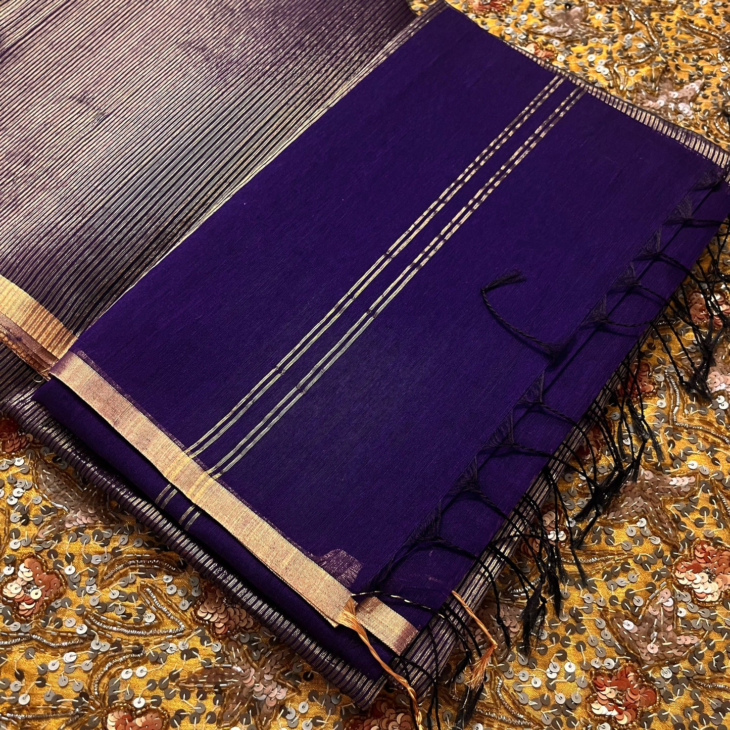 Dark purple and gold maheshwari saree with zari border