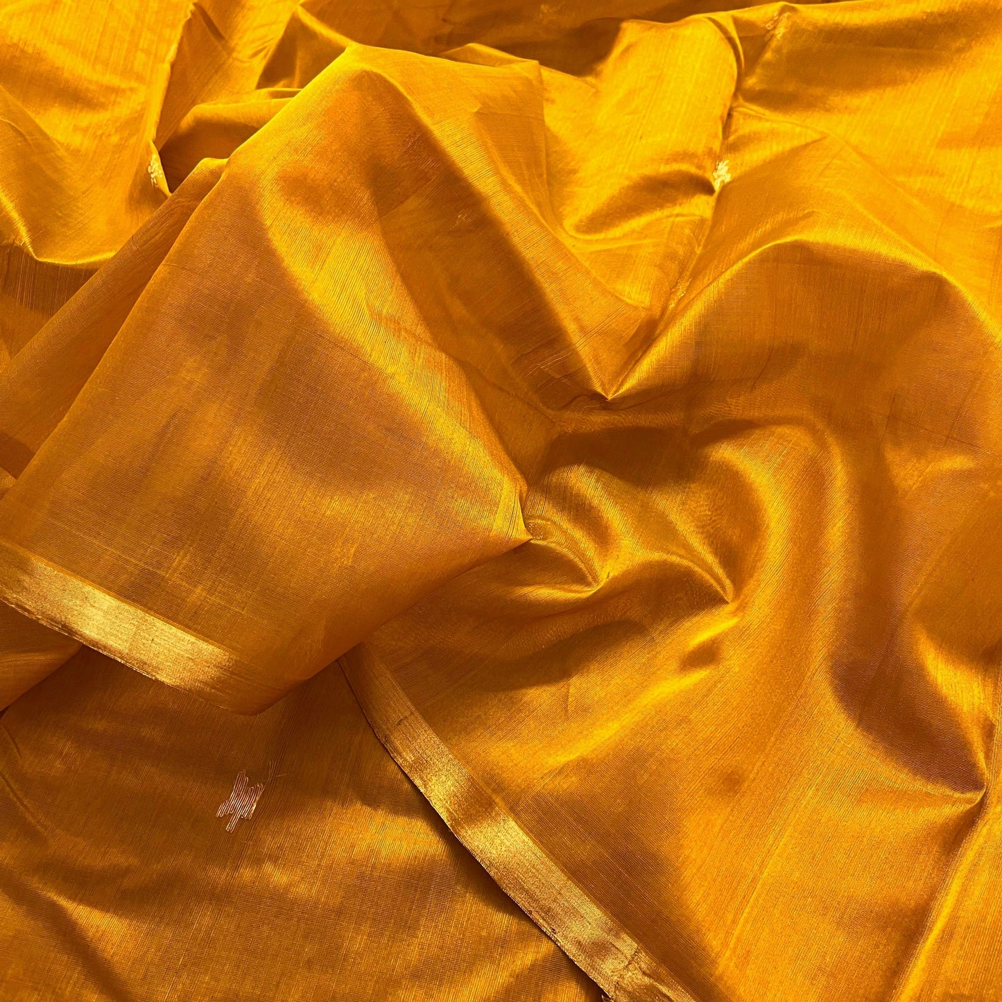 Mustard gold chanderi silk saree with flower bootis all over