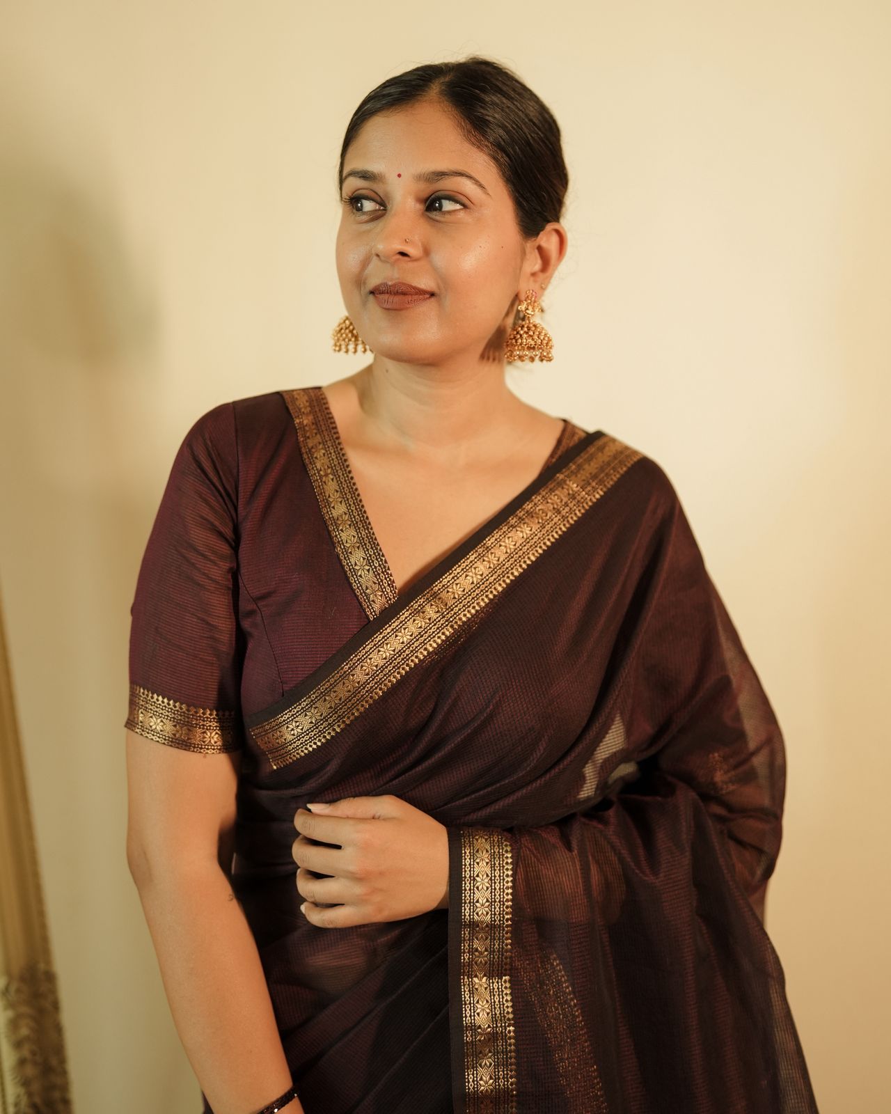 Mahogany Maheshwari saree with zari border and zari lines on pallu