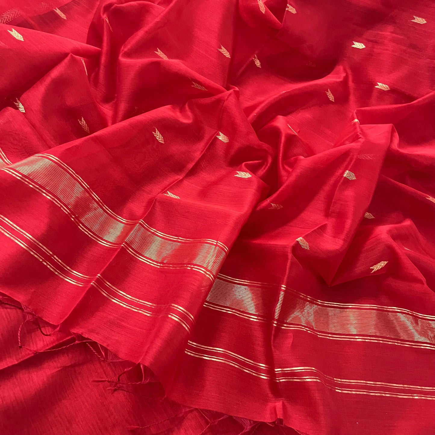 Red maheshwari saree with zari border & zari bootis all over