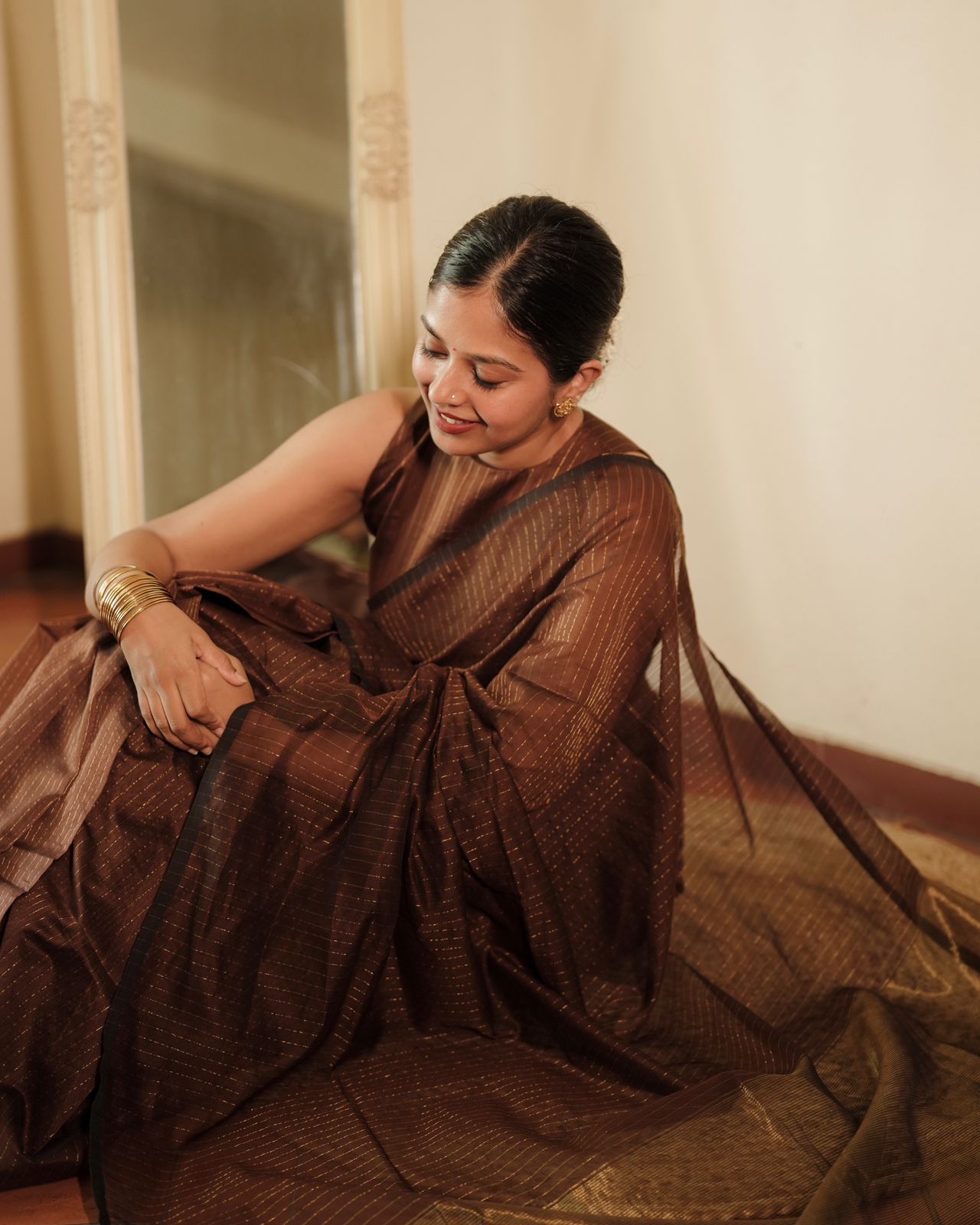 Chocolate brown Maheshwari saree with zari lines all over