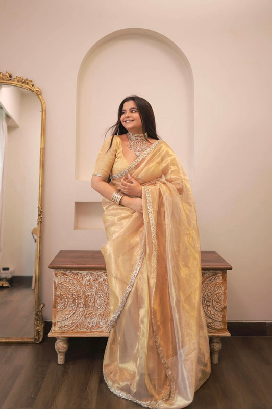 Molten gold chanderi tissue silk saree with intricate work border