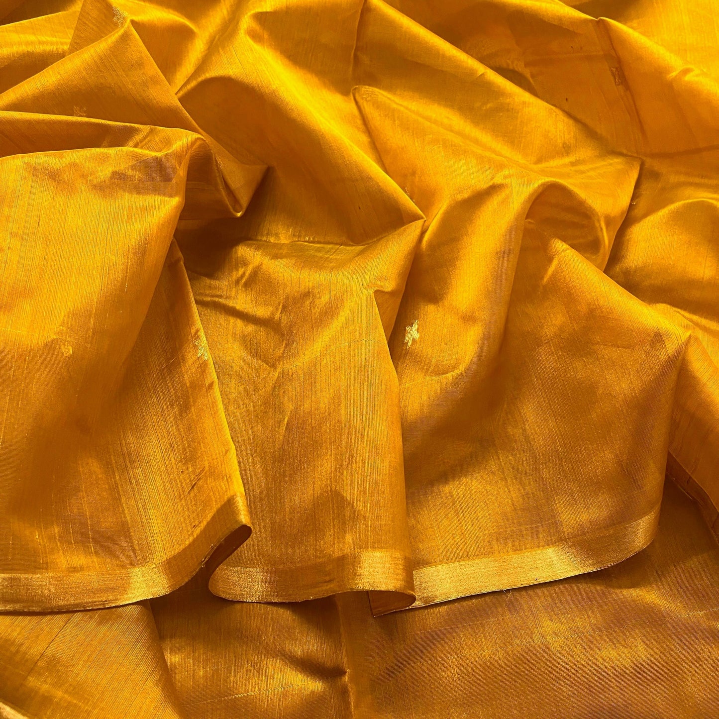 Mustard gold chanderi silk saree with flower bootis all over