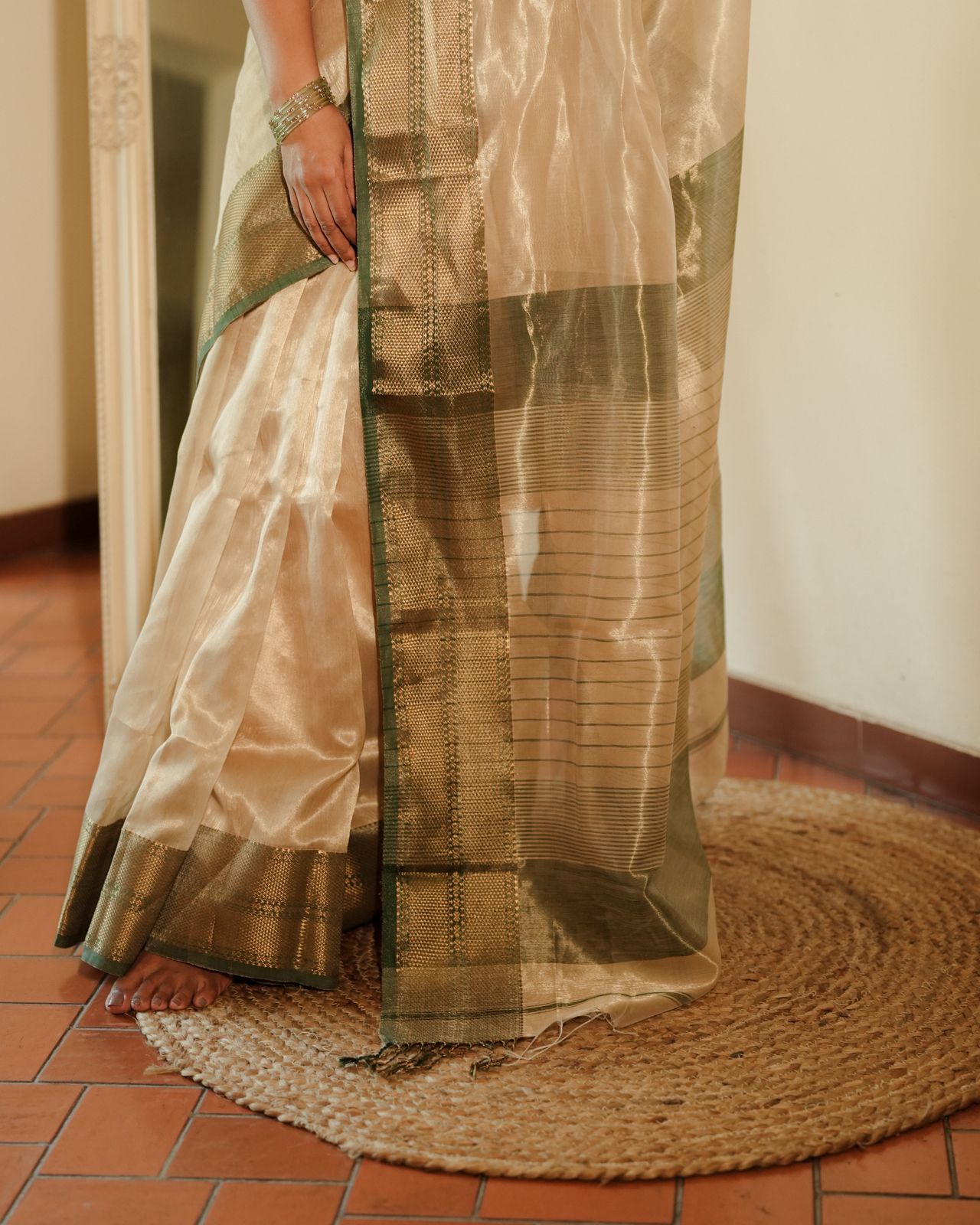 Cream Gold and green Maheshwari tissue silk saree with zari pattern on pallu