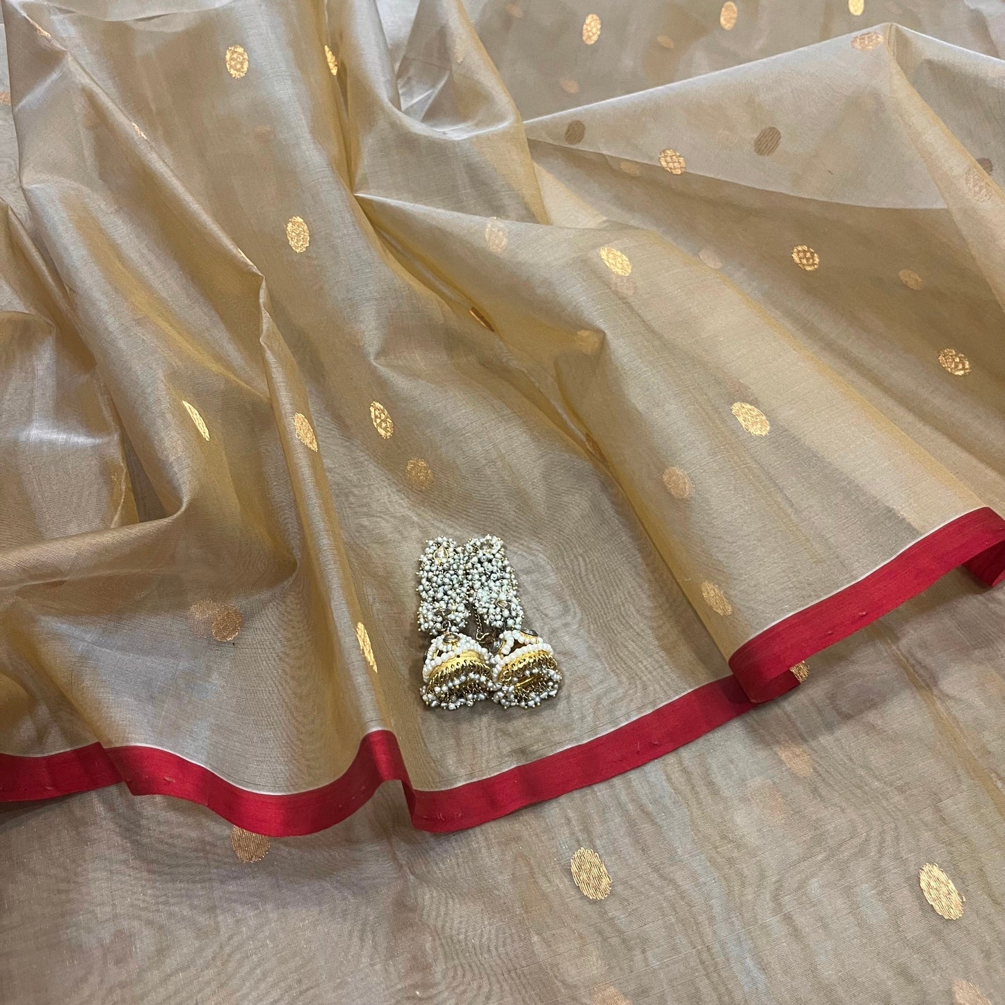 Beige gold and red Chanderi silk saree with zari bootis all over