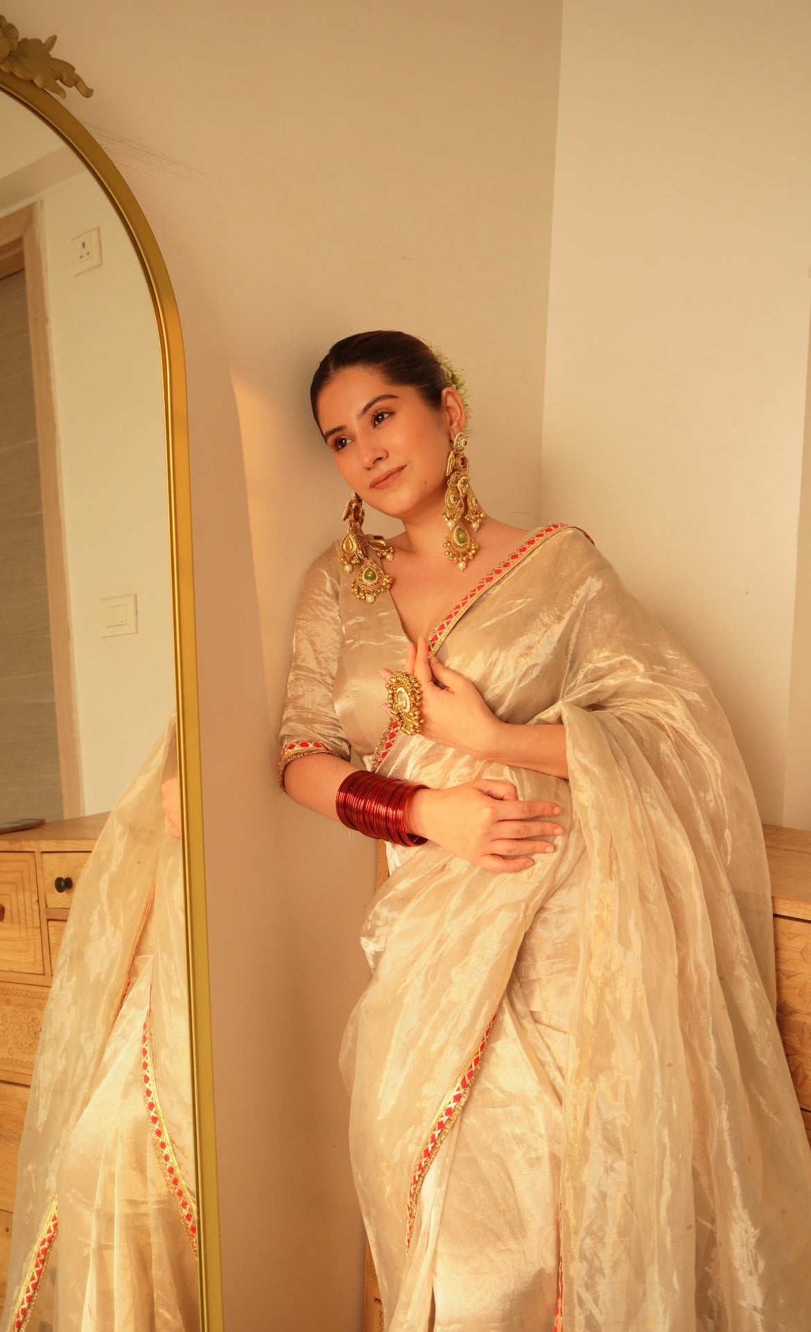 Chantilly cream and red Chanderi tissue silk saree with zari bootis all over