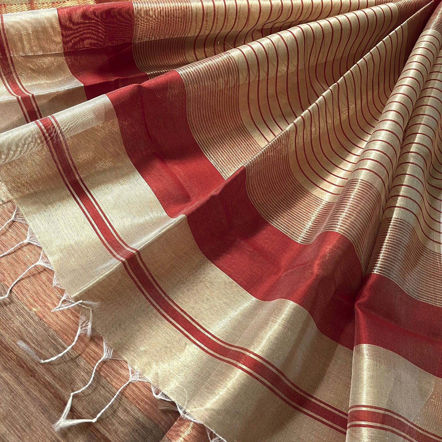 Gold & red maheshwari tissue silk saree with zari border
