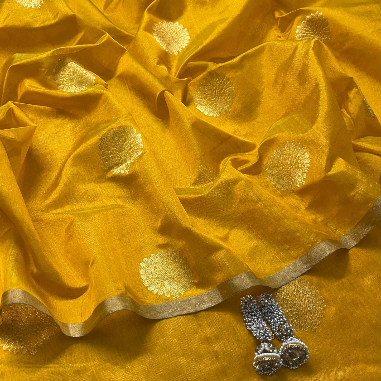 Yellow chanderi silk saree with mor motifs all over
