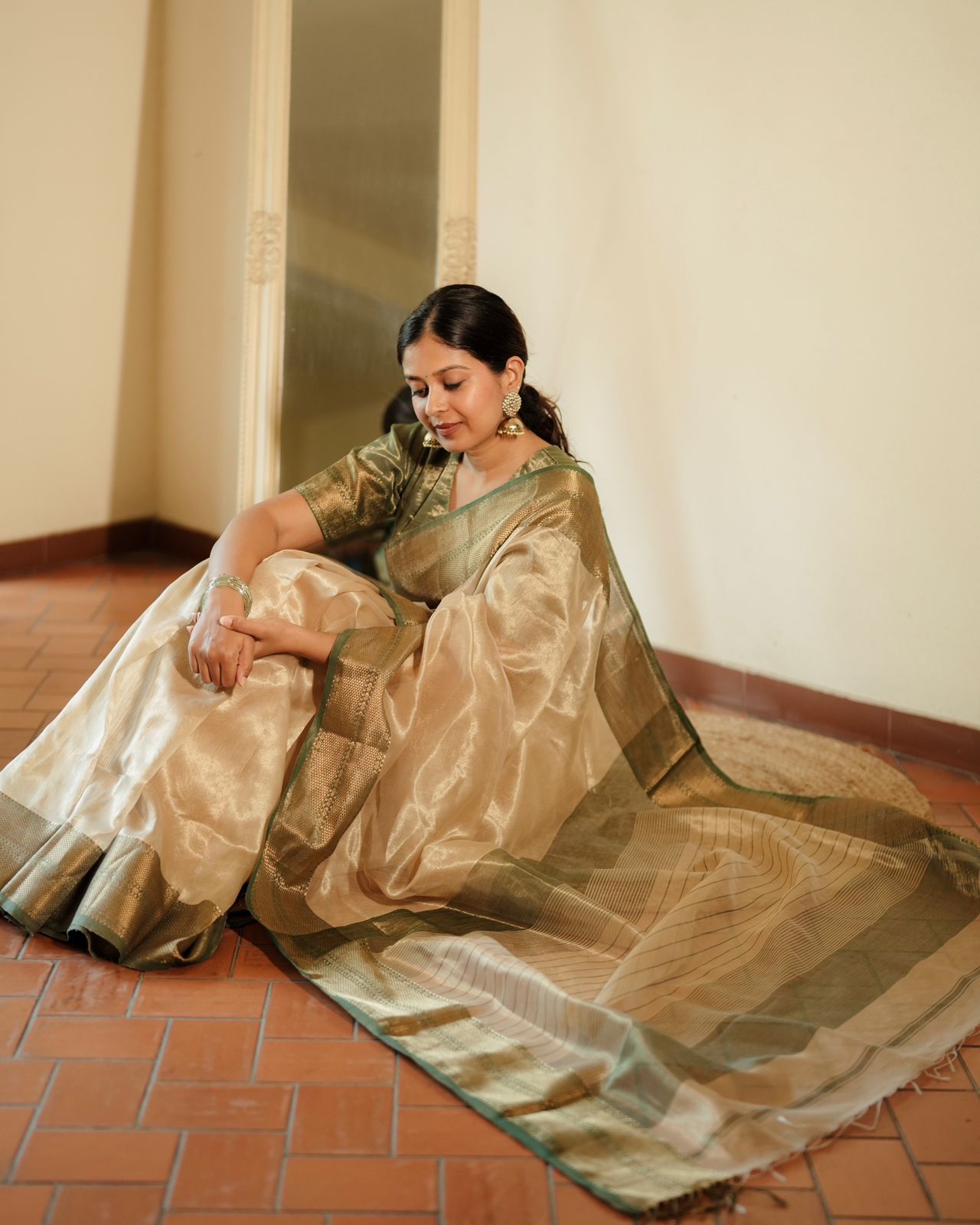 Cream Gold and green Maheshwari tissue silk saree with zari pattern on pallu
