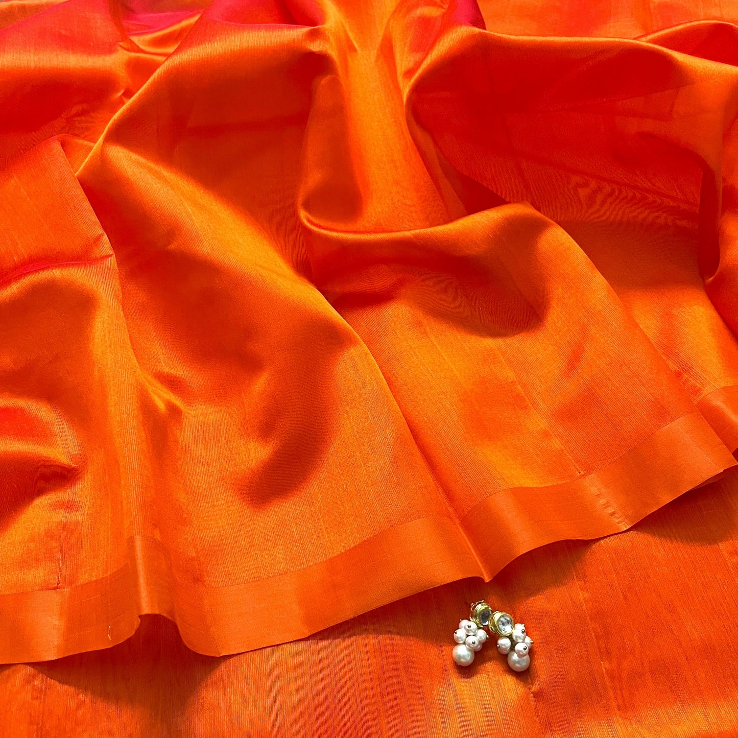 Sunset orange chanderi silk saree with silk border