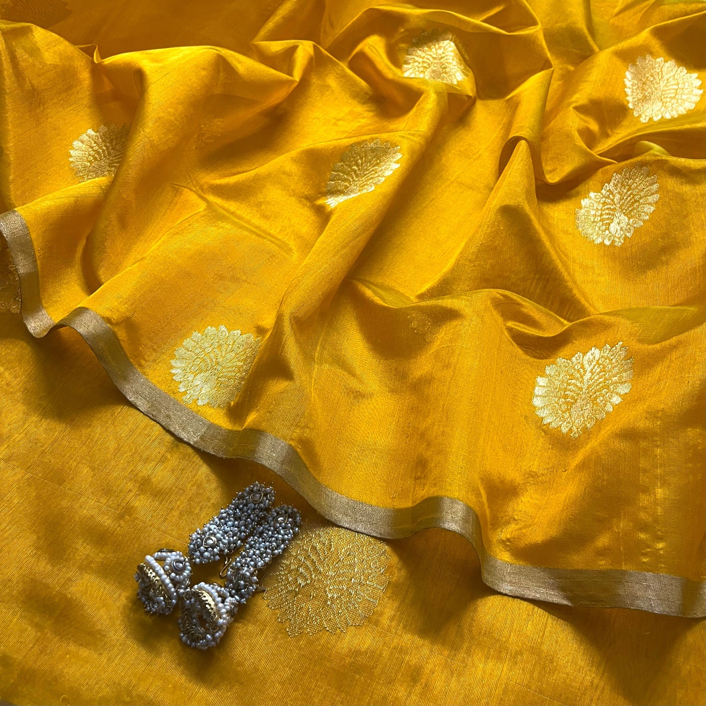 Yellow chanderi silk saree with mor motifs all over