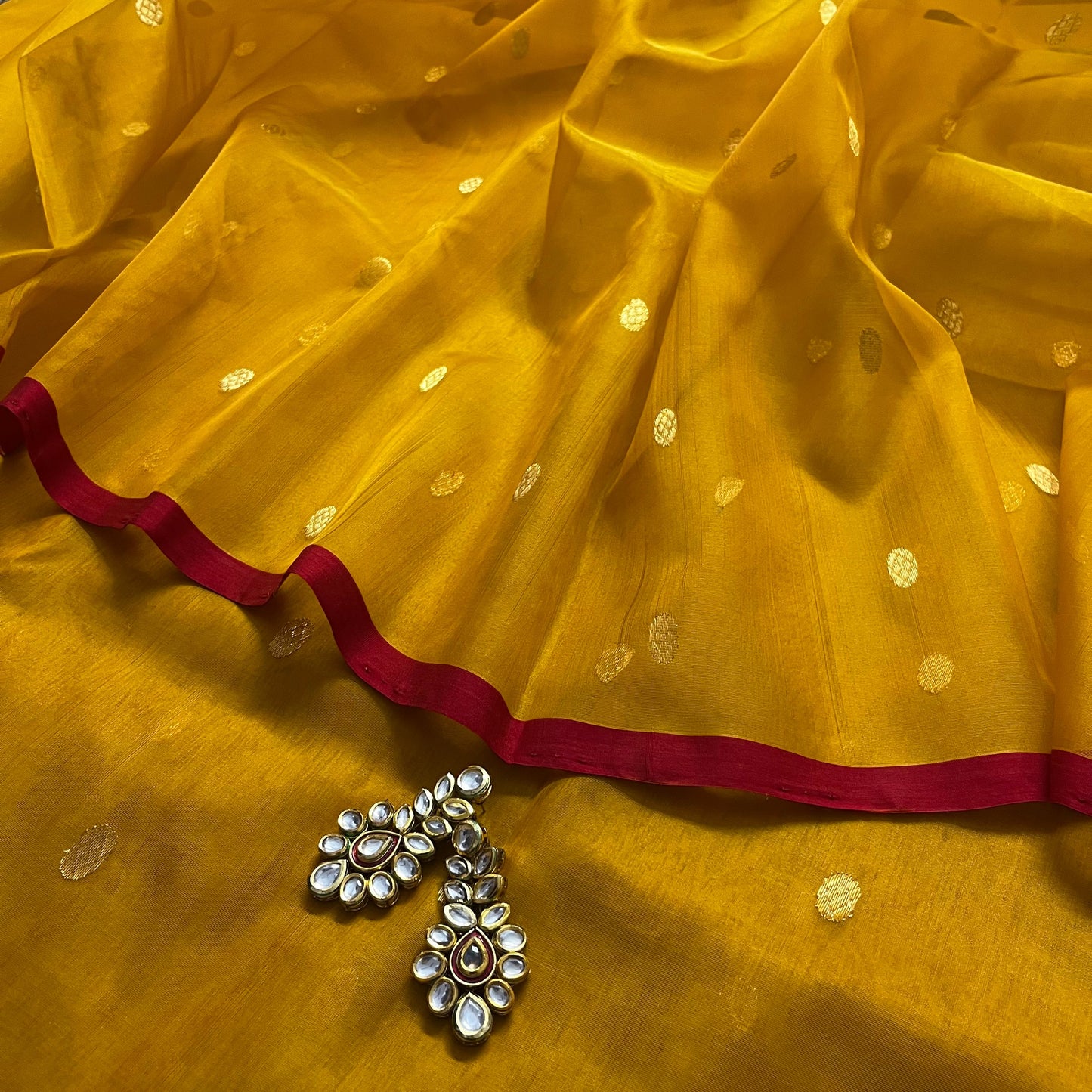 Mustard red Chanderi silk saree with zari bootis all over