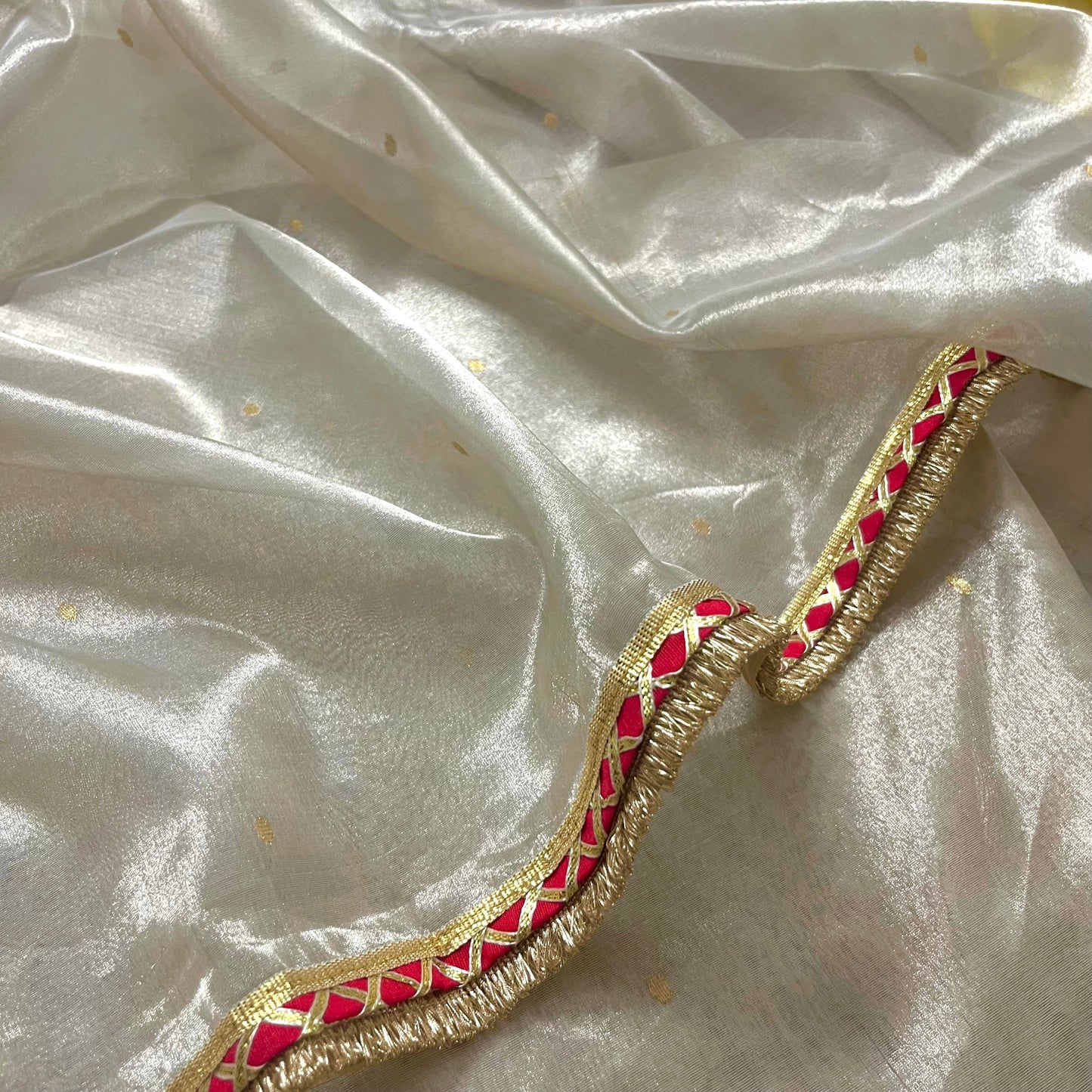 Chantilly cream and red Chanderi tissue silk saree with zari bootis all over