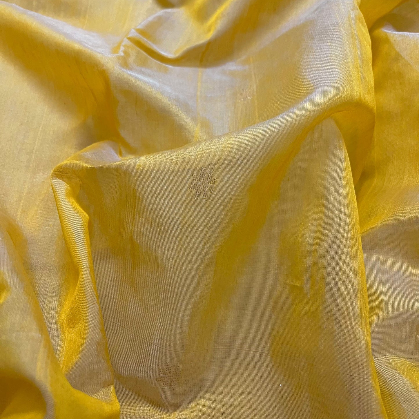 Mustard yellow Chanderi saree with zari bootis all over and flower motifs on pallu