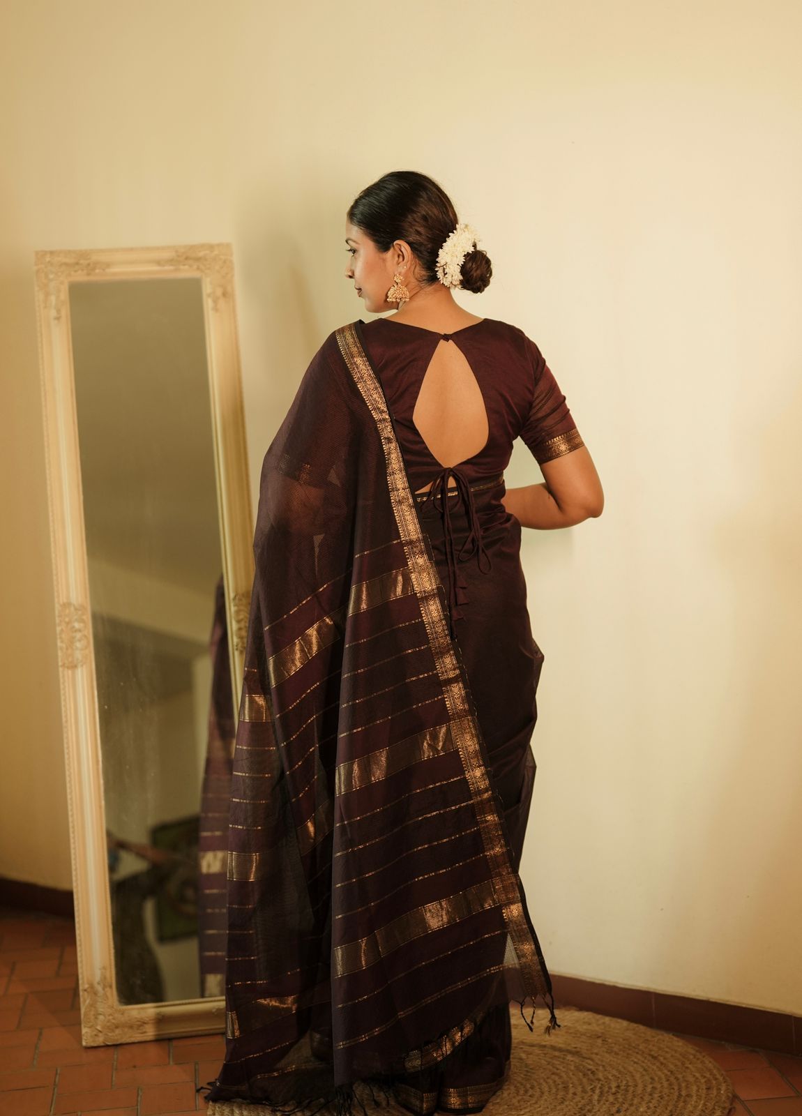 Mahogany Maheshwari saree with zari border and zari lines on pallu