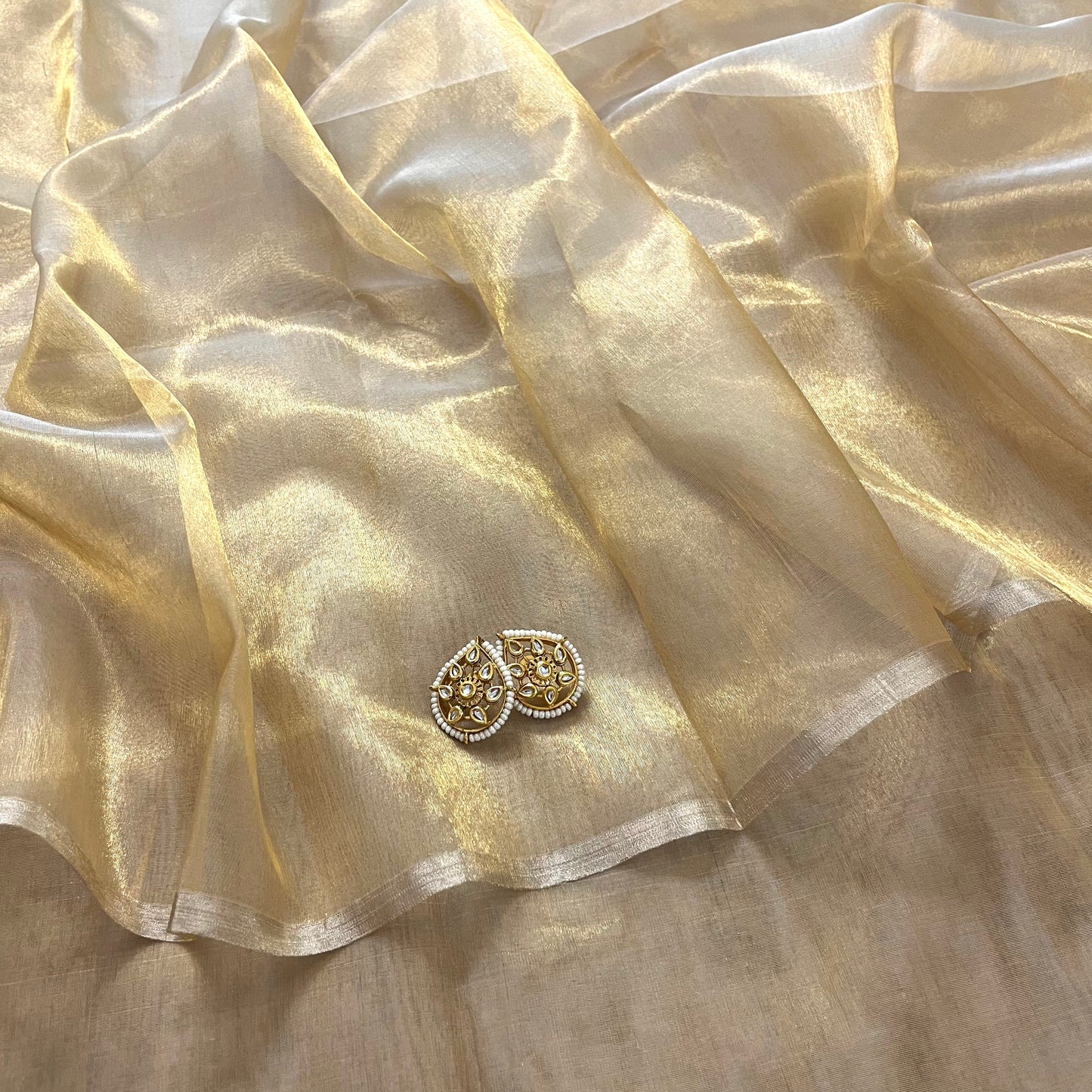 Molten gold chanderi tissue silk saree with zari lines on pallu