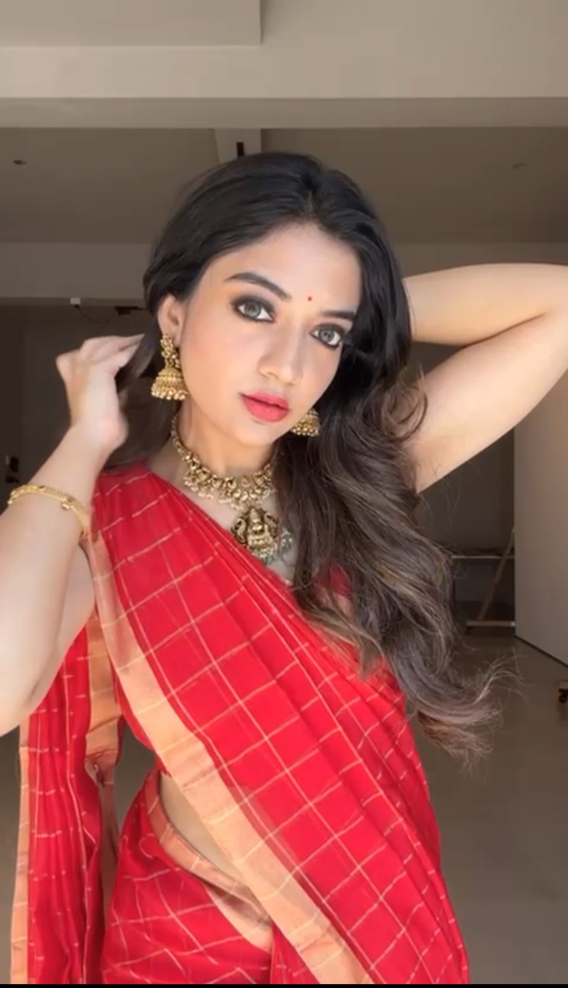 Red maheshwari saree with zari checks all over