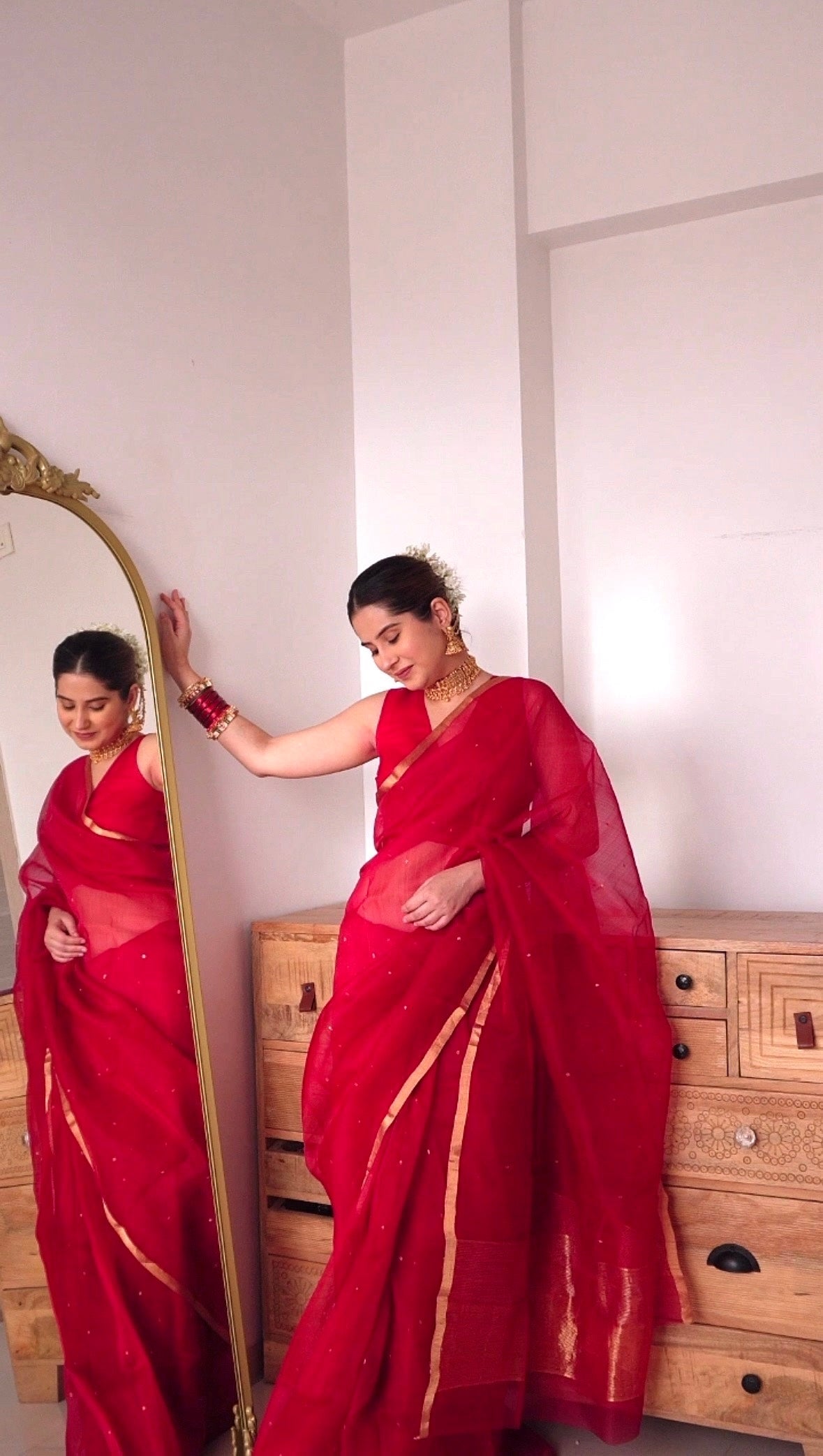 Deep red chanderi organza silk saree with zari bootis all over