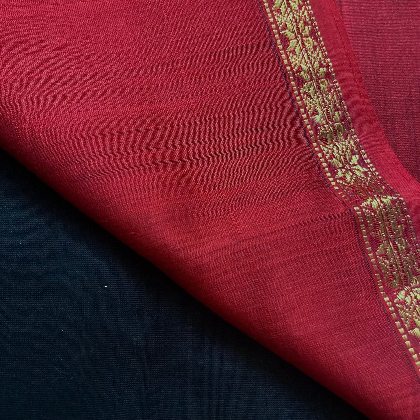 Black and maroon Maheshwari saree with flower bootis all over