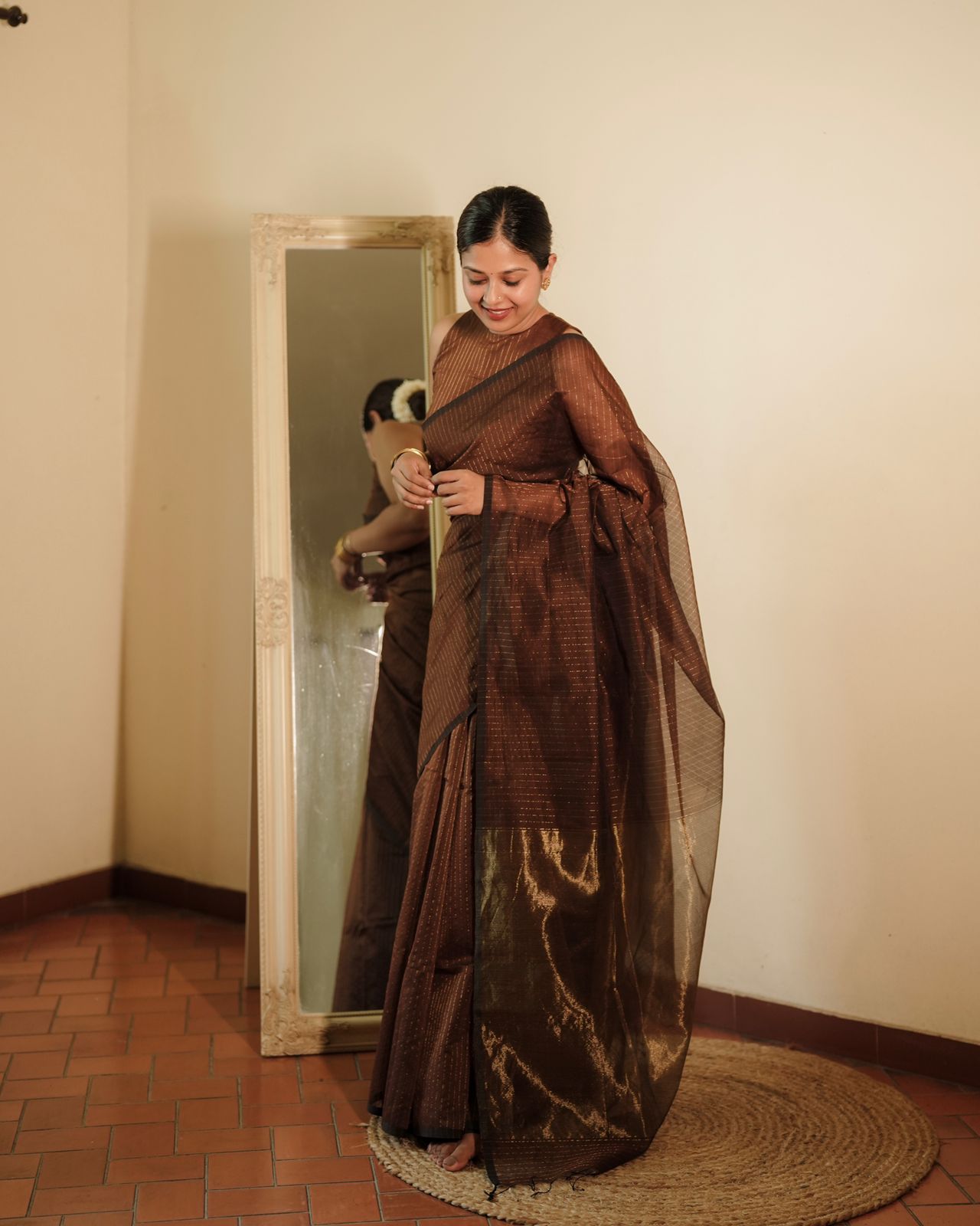 Chocolate brown Maheshwari saree with zari lines all over