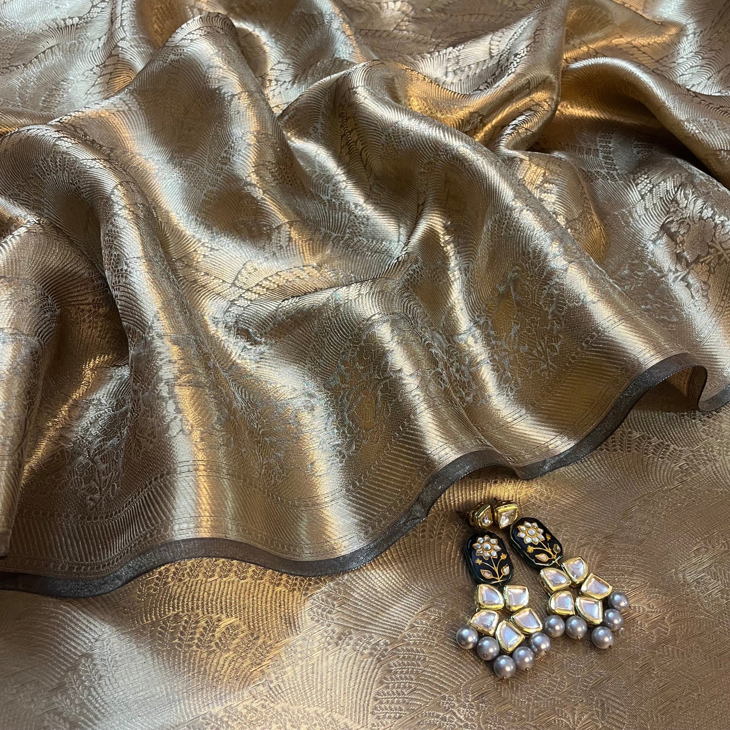 Antique gold Banarasi brocade silk saree with zari pattern all over