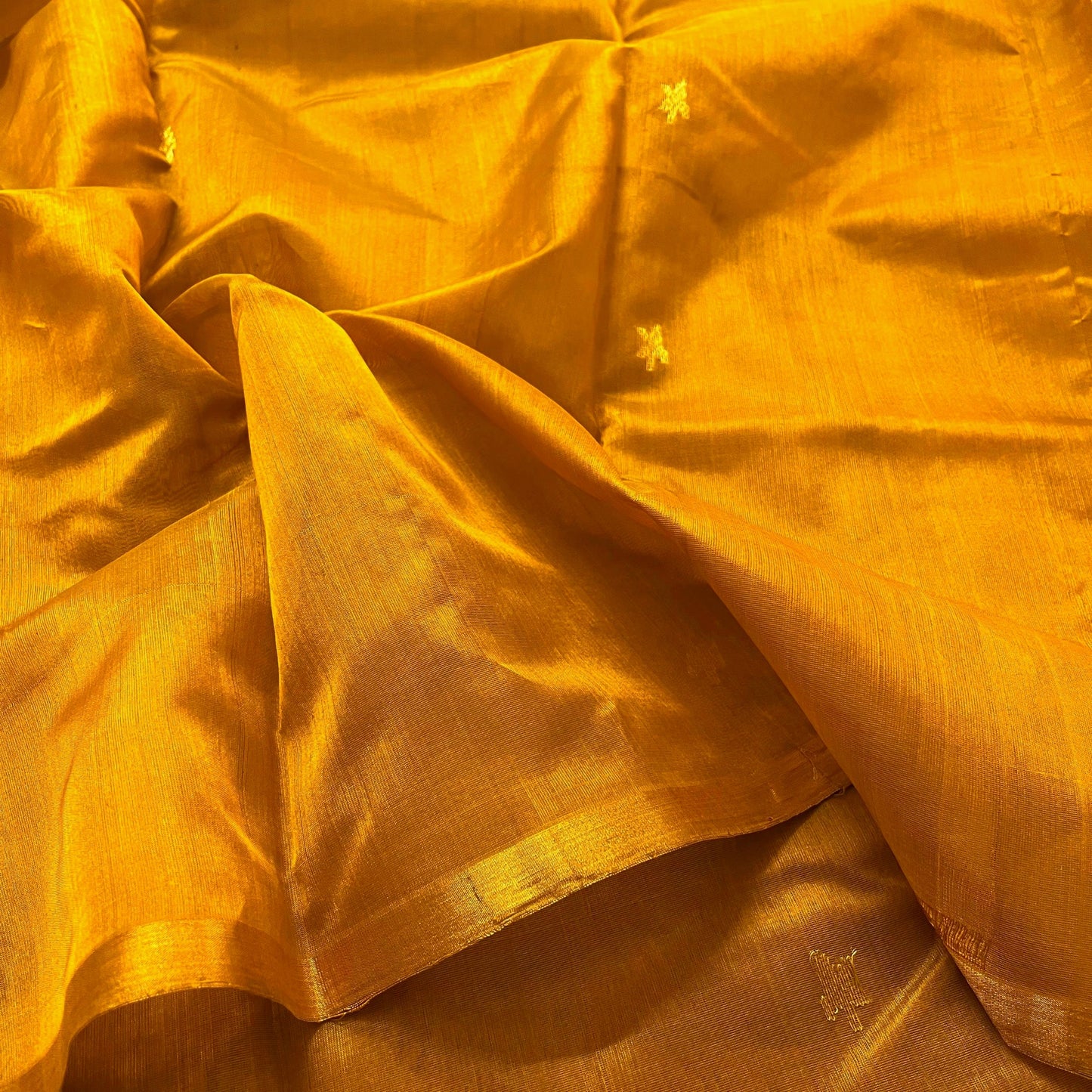 Mustard gold chanderi silk saree with flower bootis all over