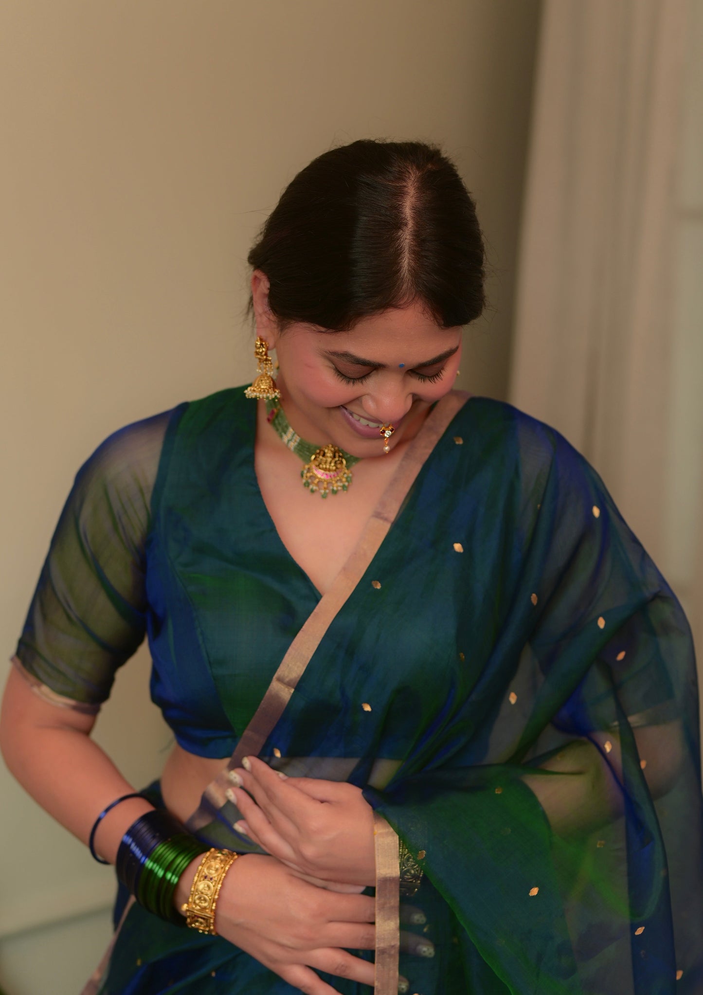 Peacock Blue & Green Dual Tone Chanderi Organza Silk Saree with Zari Bootis all over