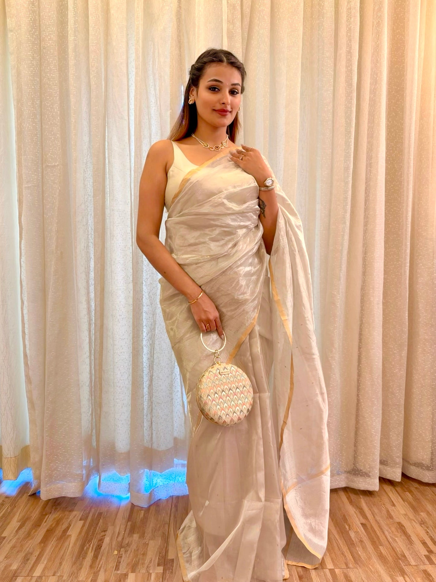 Chantilly cream Chanderi tissue silk saree with zari bootis all over