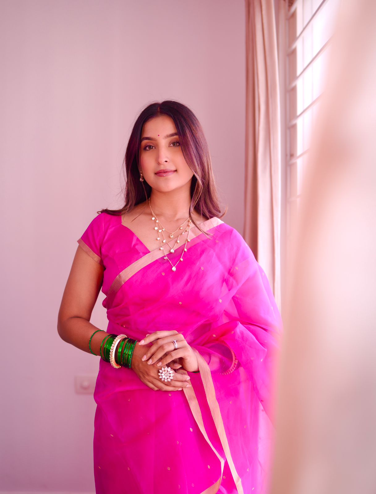 Fuschia pink Chanderi silk saree with zari bootis all over