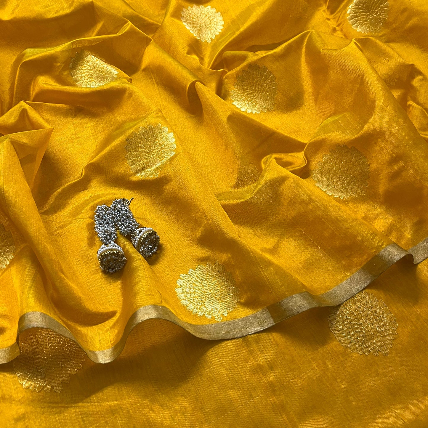 Yellow chanderi silk saree with mor motifs all over