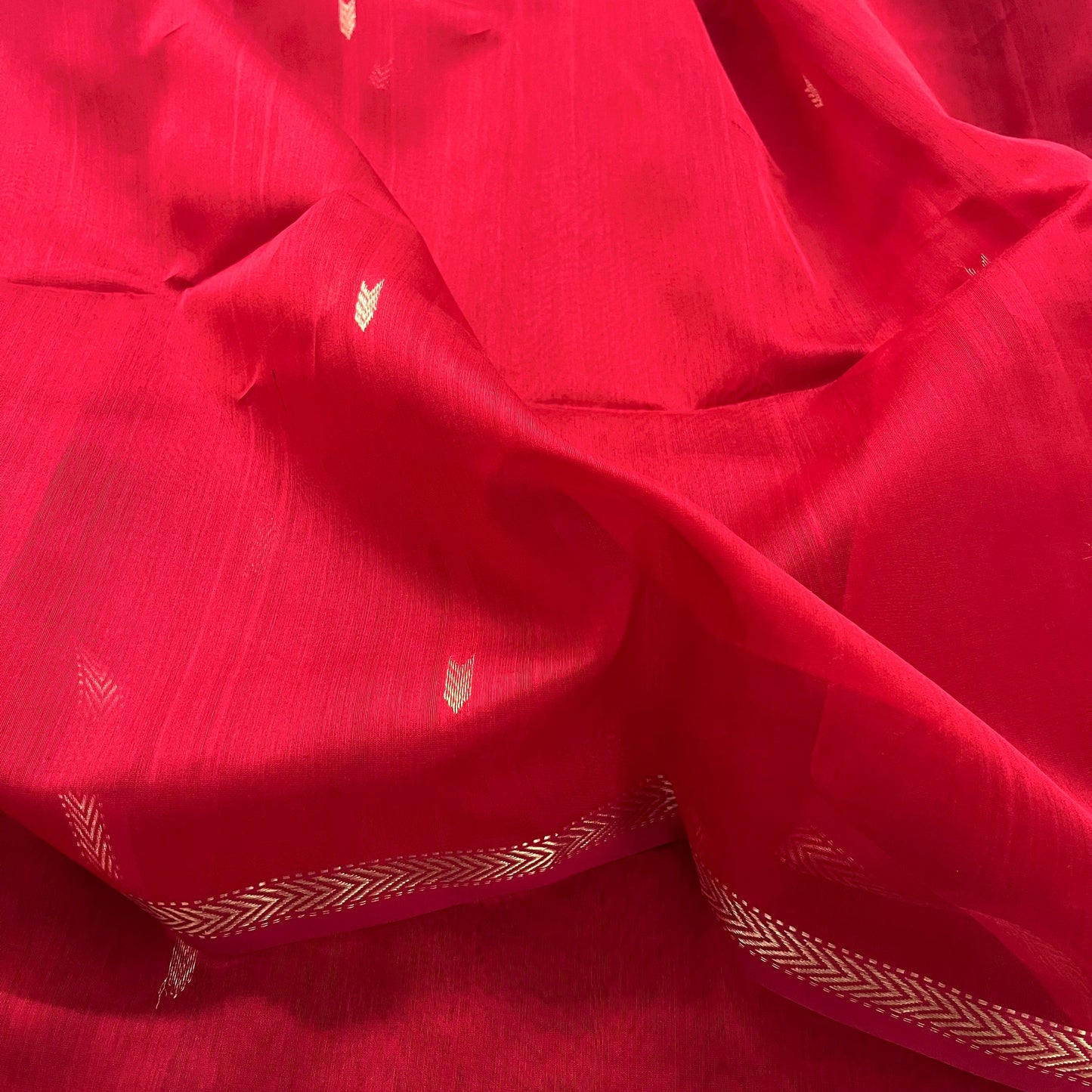 Red maheshwari saree with zari border & zari bootis all over