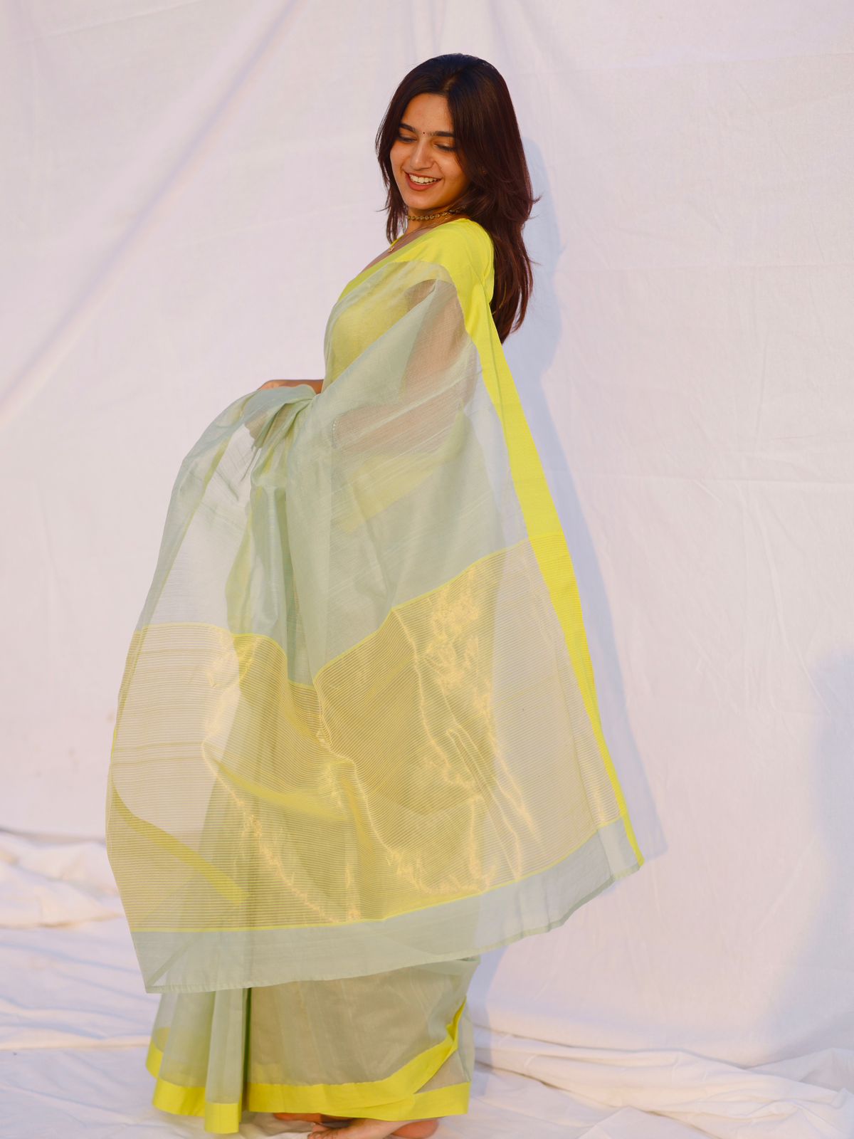 Sage and lemon Chanderi saree with zari lines on pallu