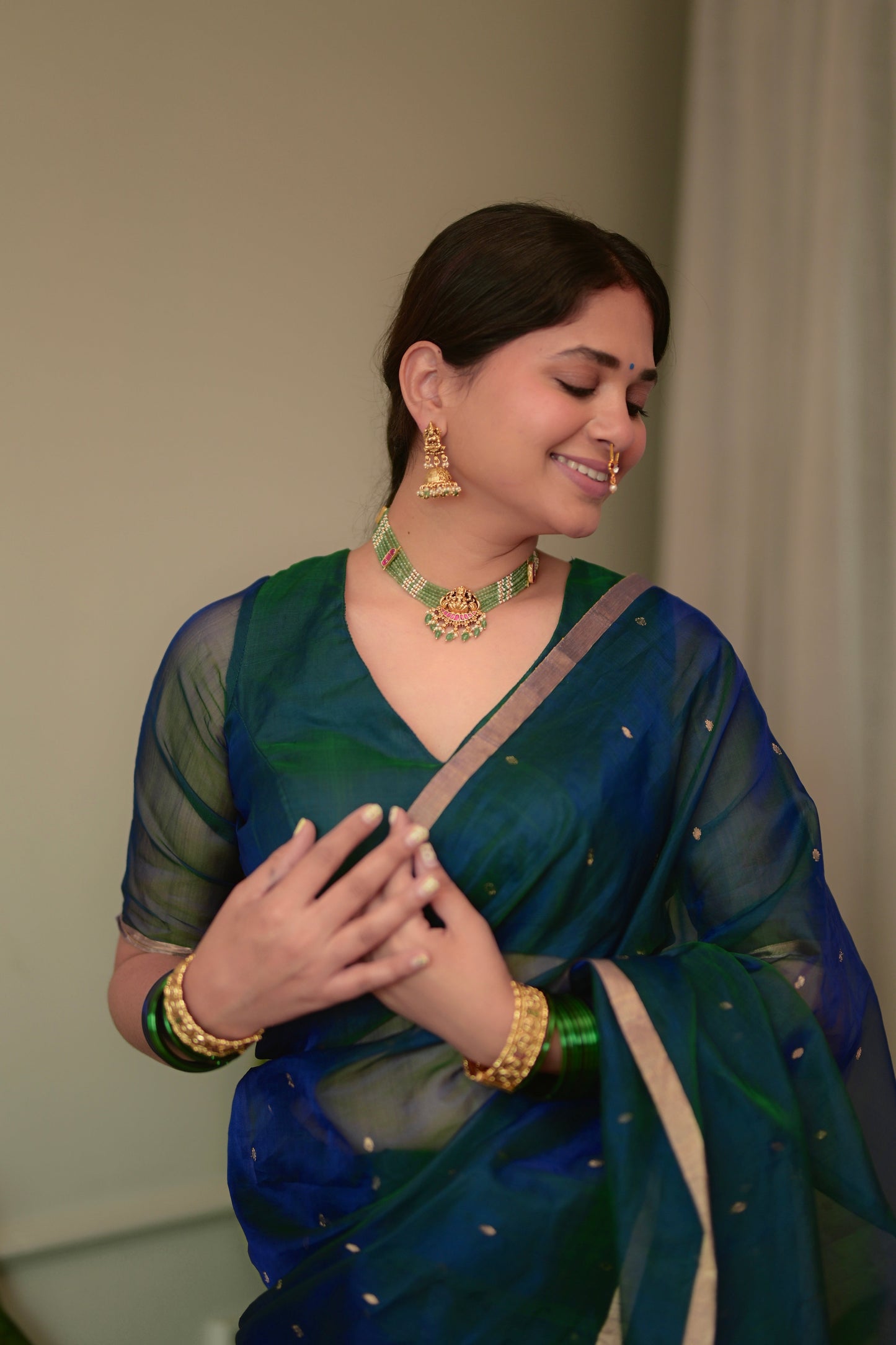 Peacock Blue & Green Dual Tone Chanderi Organza Silk Saree with Zari Bootis all over