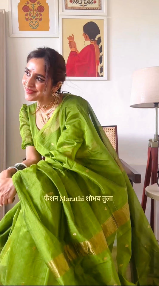 Olive green maheshwari saree with zari bootis all over