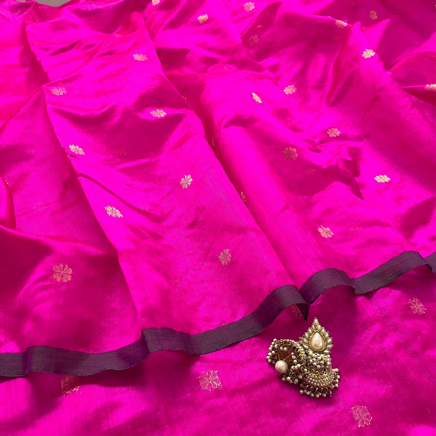 Magenta pink chanderi silk saree with flower bootis all over