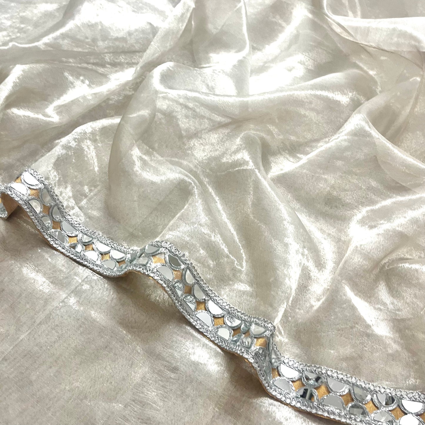 Molten silver and gold chanderi tissue silk saree with mirror work border