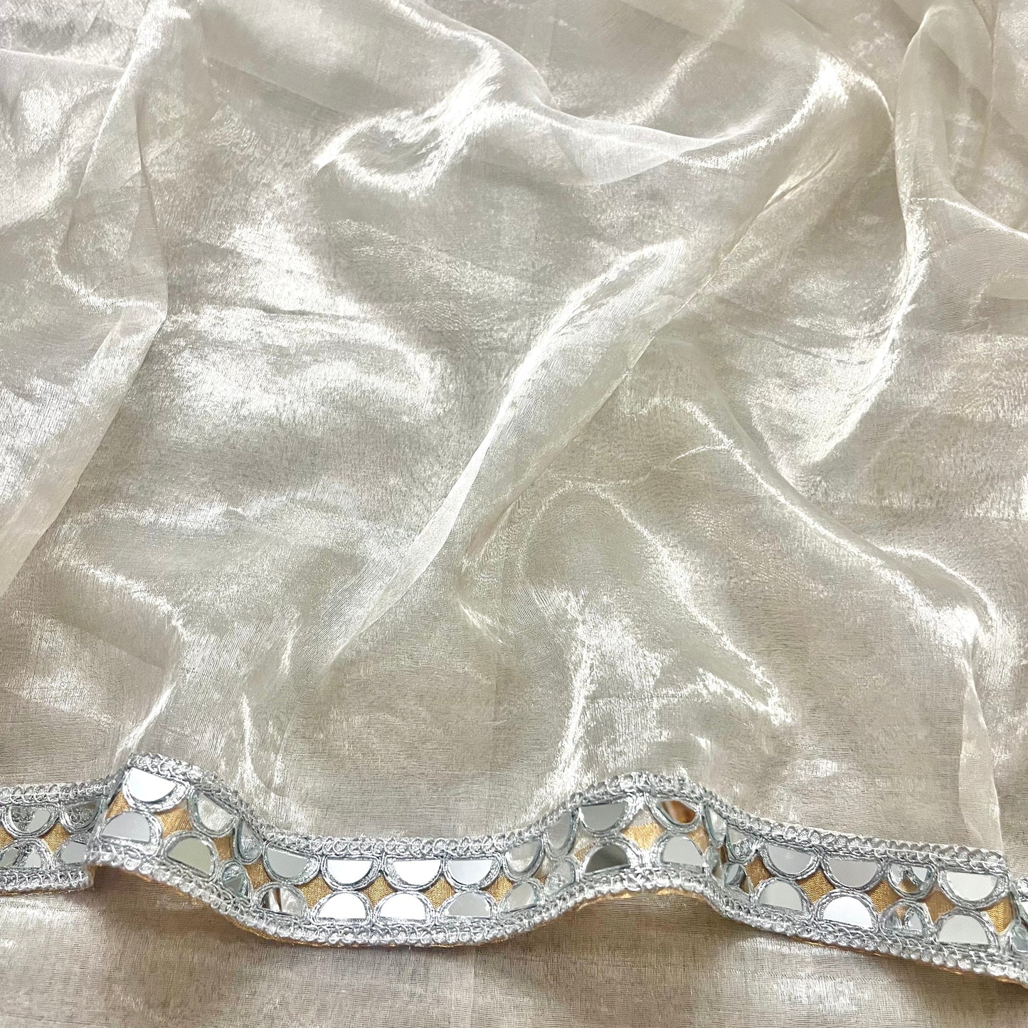 Molten silver and gold chanderi tissue silk saree with mirror work border