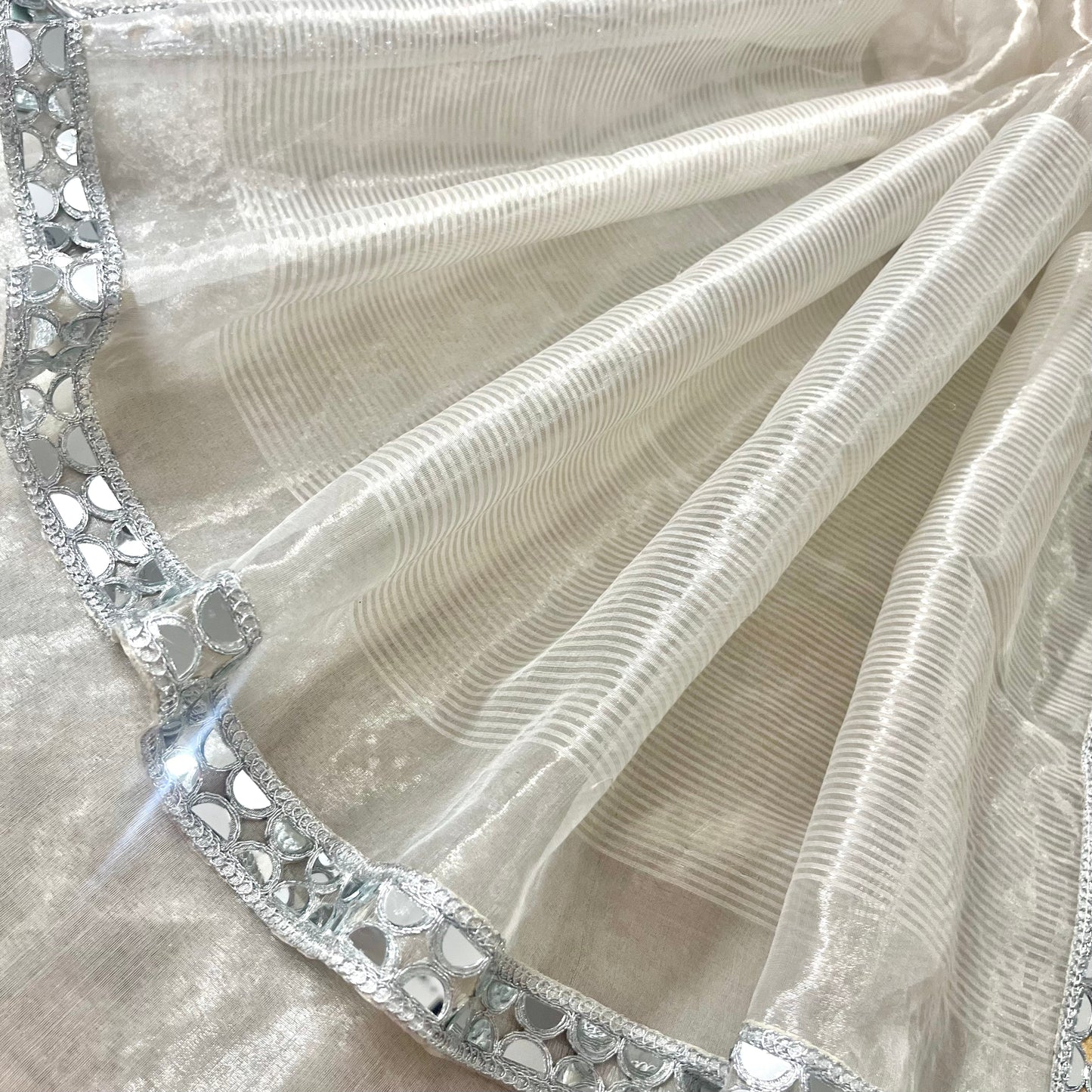 Molten silver and gold chanderi tissue silk saree with mirror work border