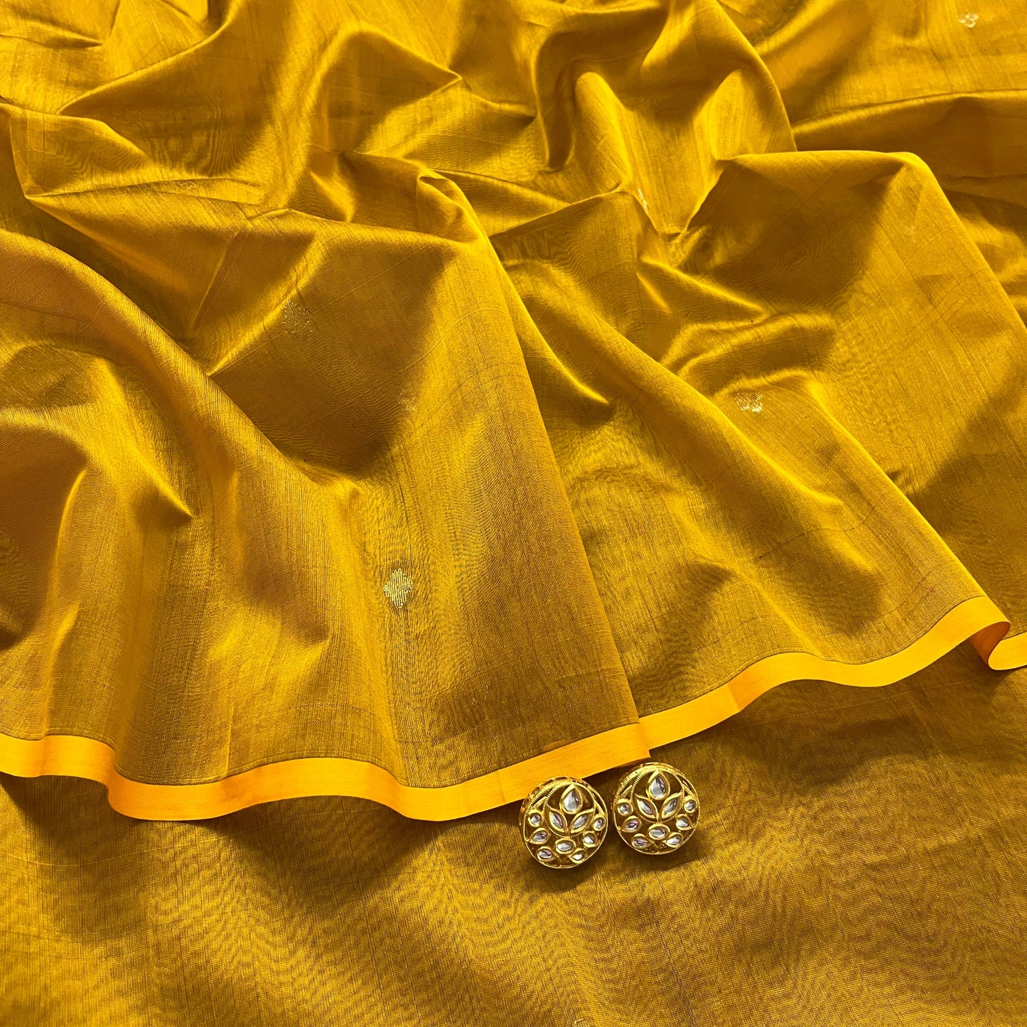 Gold mustard maheshwari saree with zari bootis all over