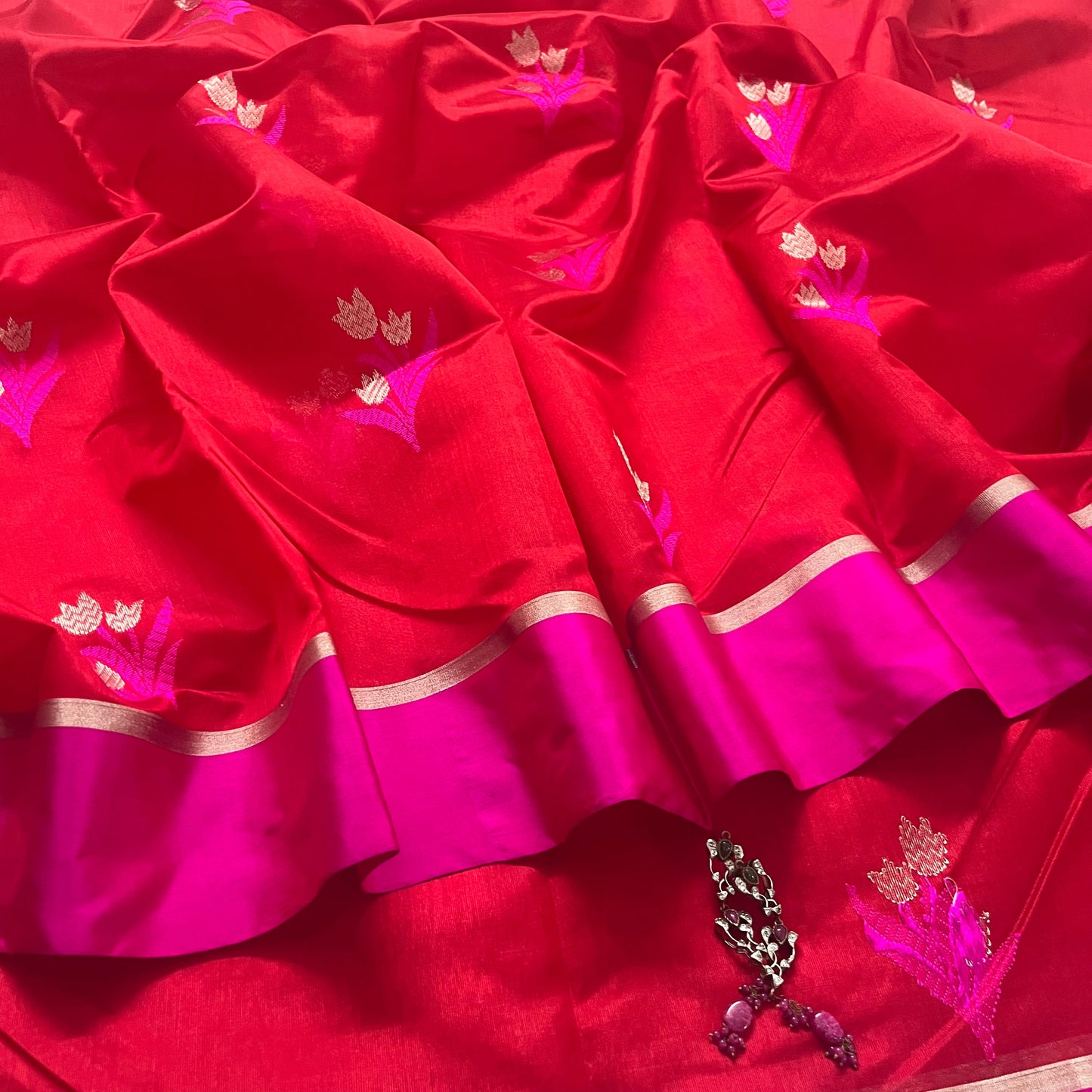 Red and pink chanderi saree with flower motifs all over