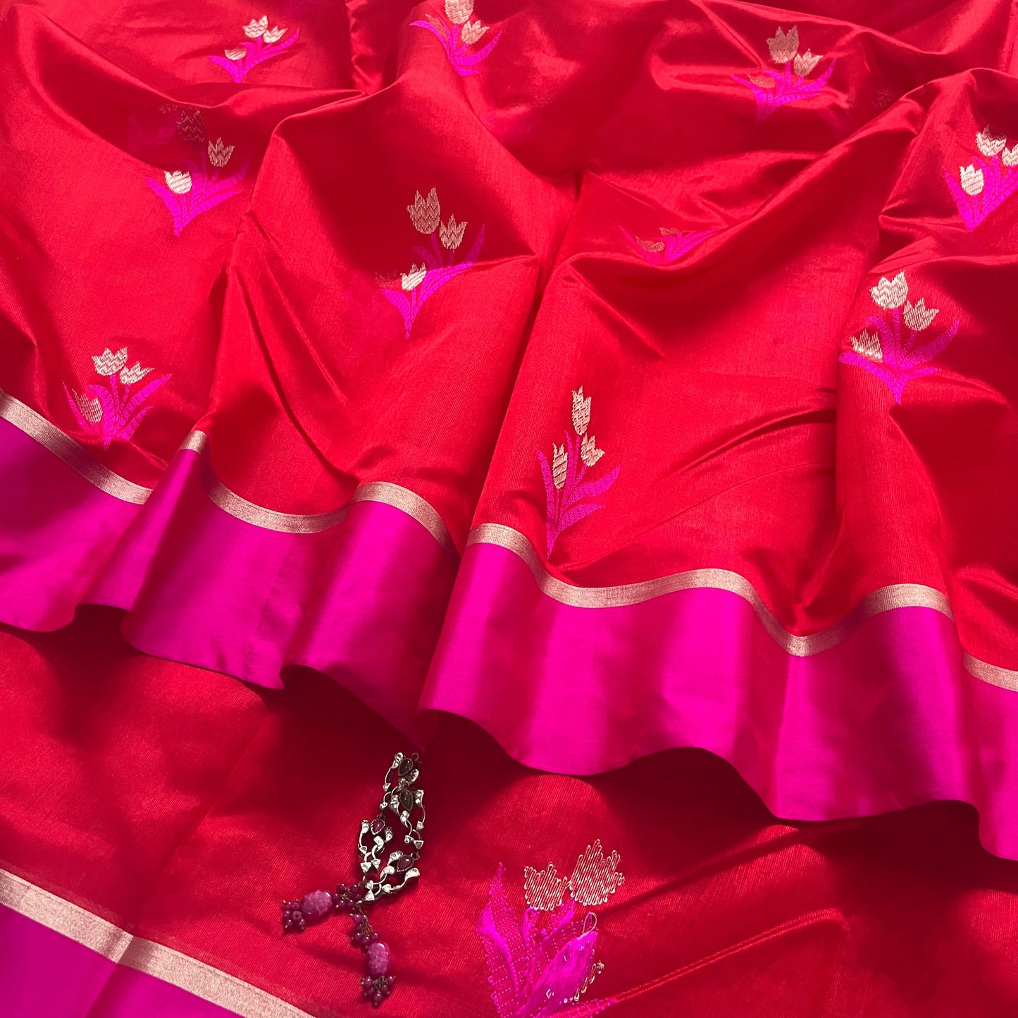 Red and pink chanderi saree with flower motifs all over